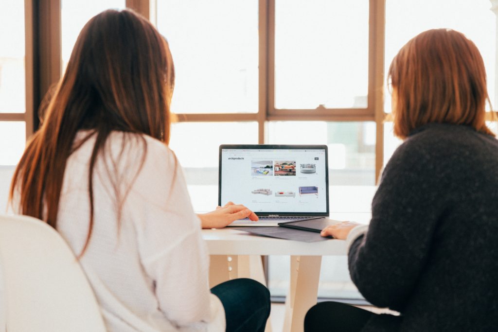 women looking at a computer