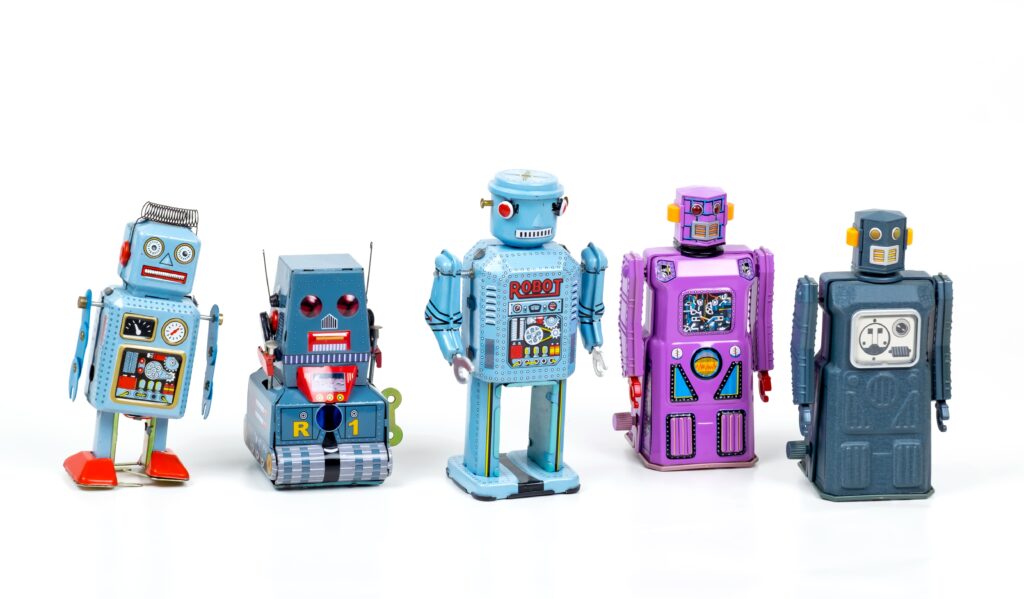 Old school style multicoloured robots in a line